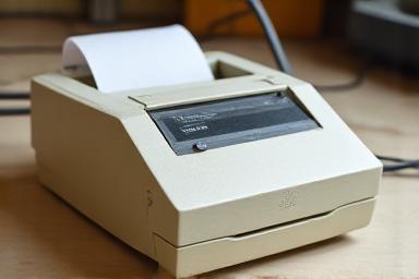 An older but well-maintained dot matrix printer.